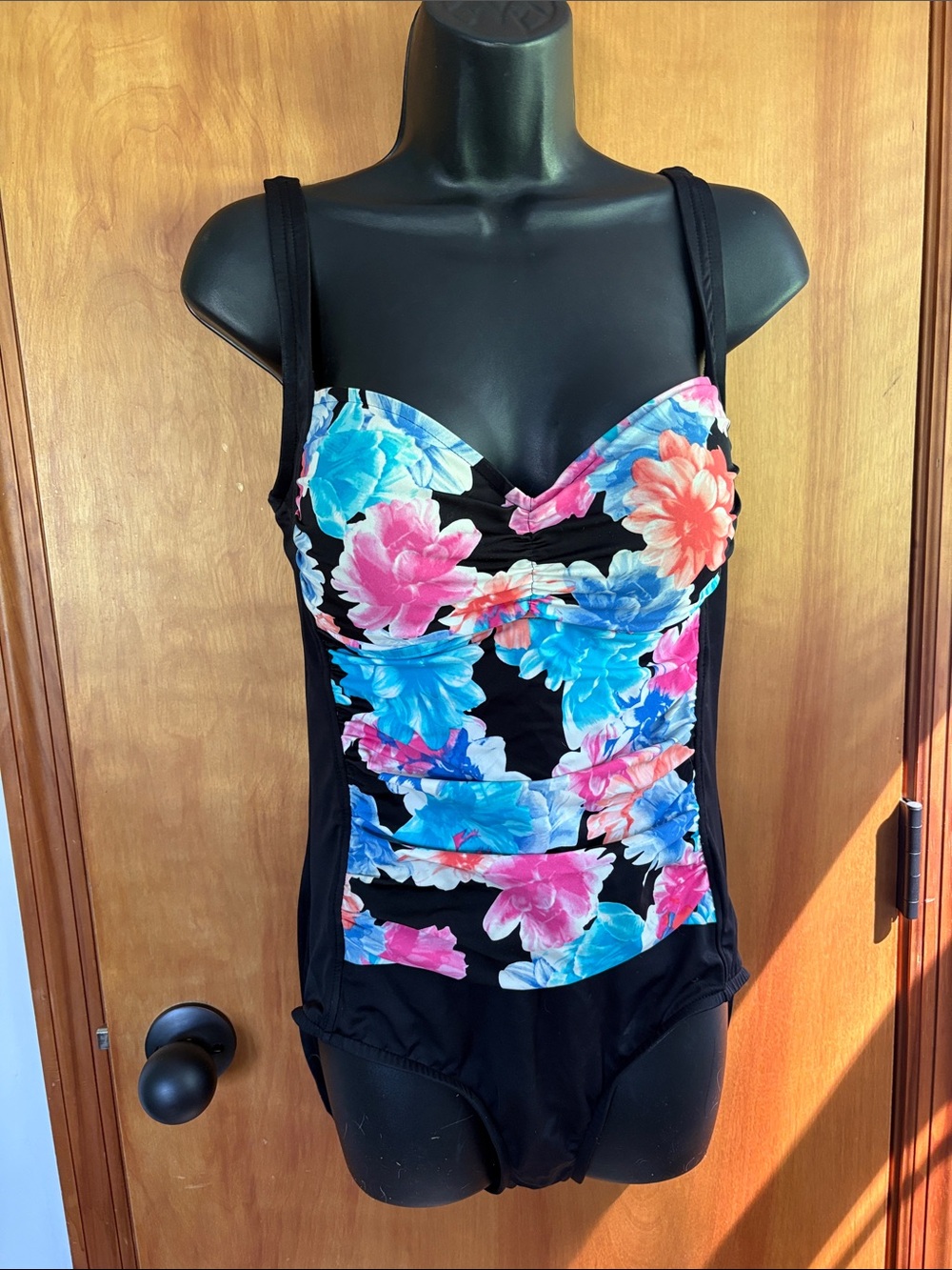 Black One-Piece Swimsuit with Vibrant Floral Print